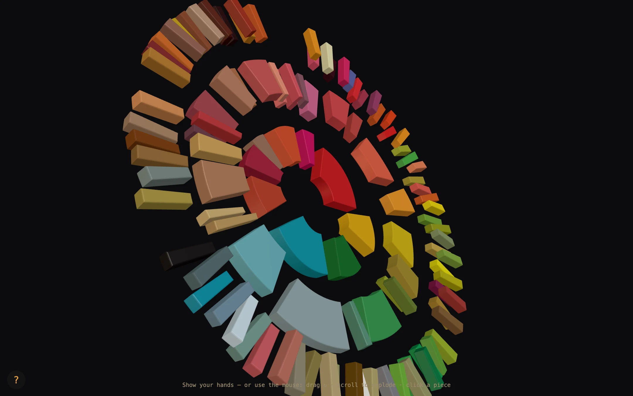 The wheel spread apart: each coloured piece floats separately in three rings