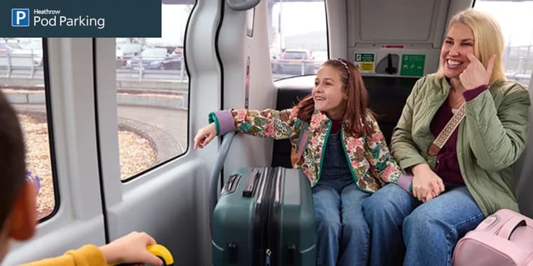 The Pod Parking tab’s photograph: a family laughing inside a driverless pod
