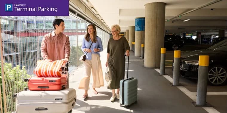 The Terminal Parking tab’s photograph: travellers with suitcases walking through a multi-storey car park