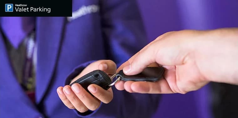 The Valet Parking tab’s photograph: a car key passed from one hand to another